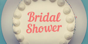 Feature image for article with bridal shower cake saying ideas